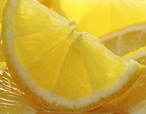 Freshly sliced sun drenched lemons.